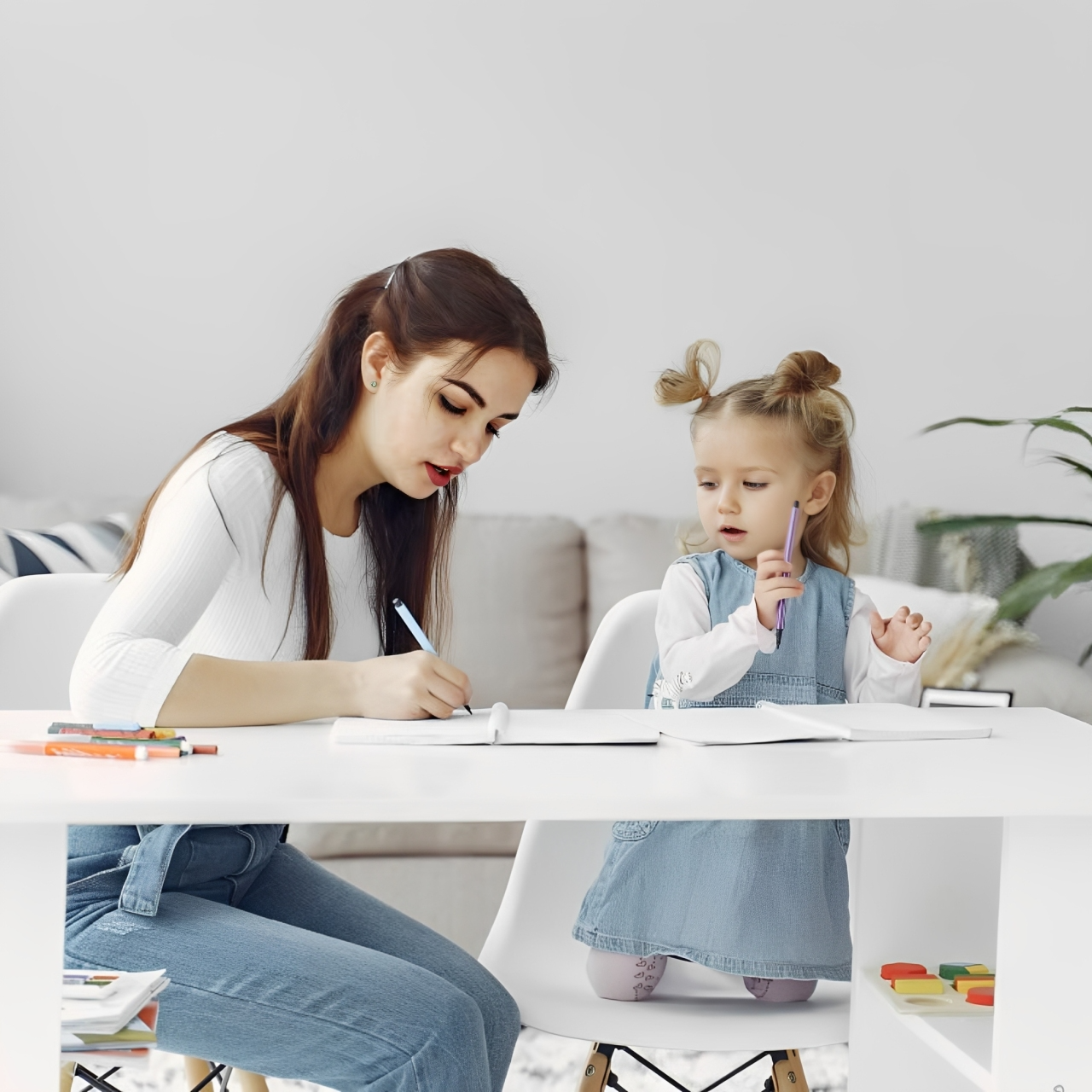 Childcare professional preparing a healthy snack for a young child at home